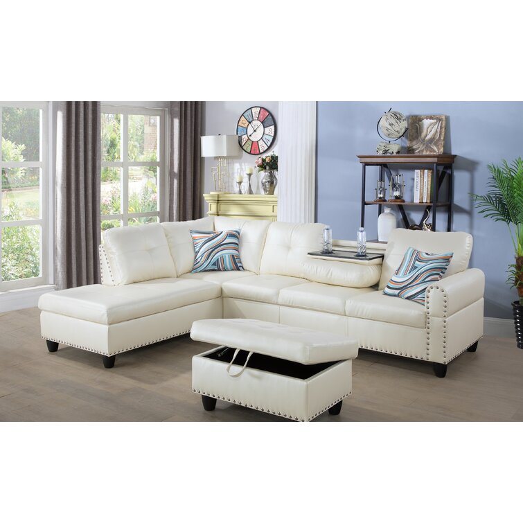 White leather sectional with shop ottoman